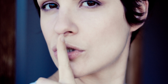 woman hushing