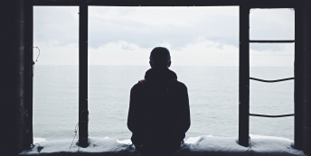 Image of man at window