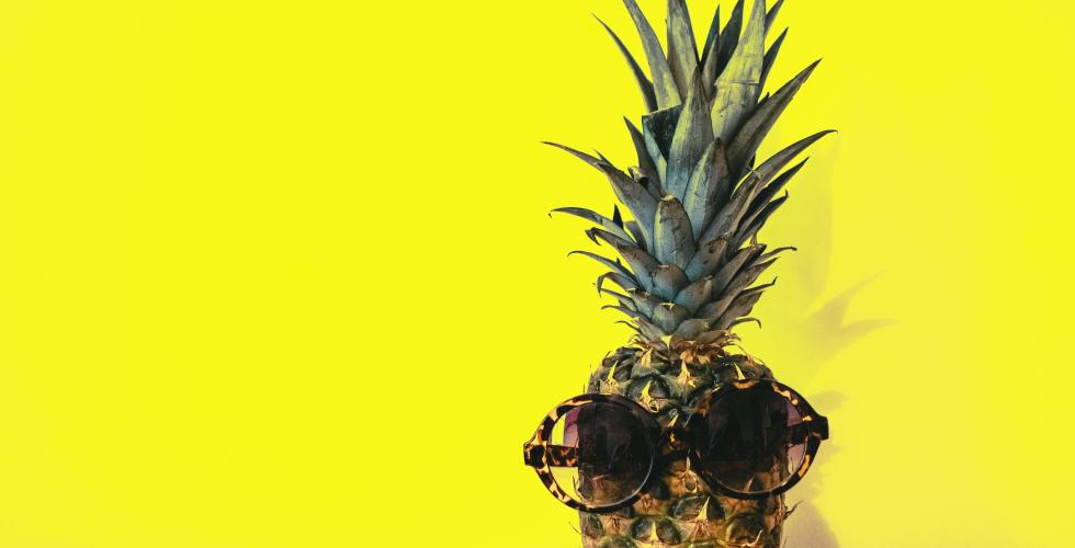 Pineapple on a bright yellow background