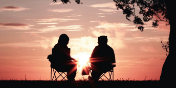 A conversation at sunset