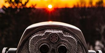 Image of binoculars at sunset