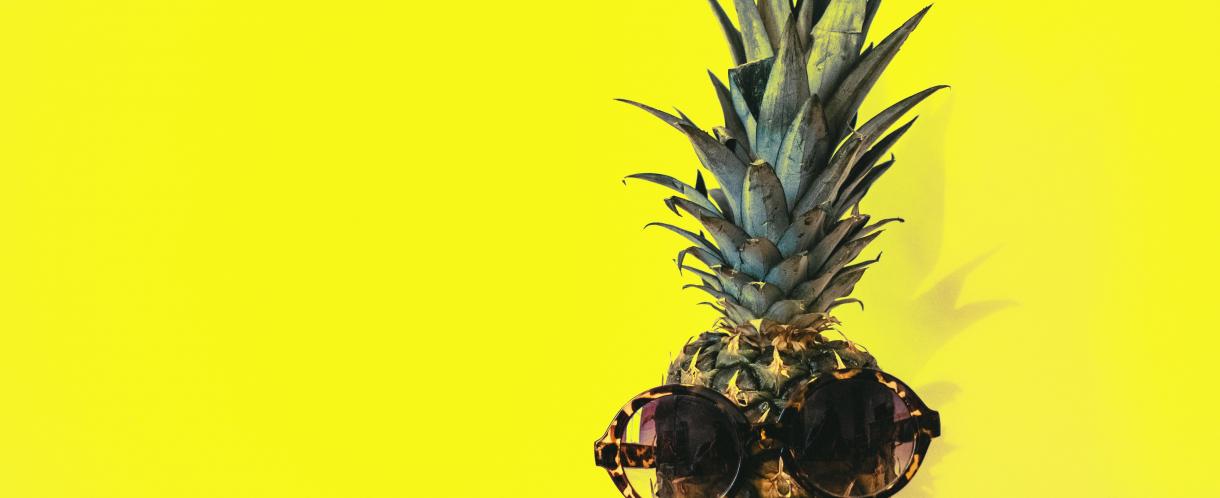 Pineapple on a bright yellow background