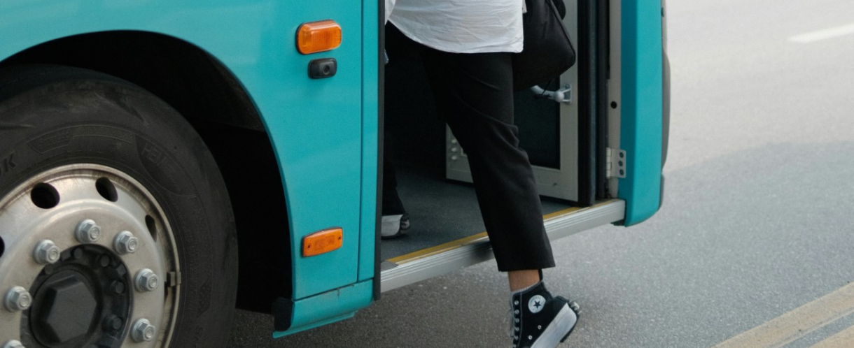 Image of someone boarding a bus