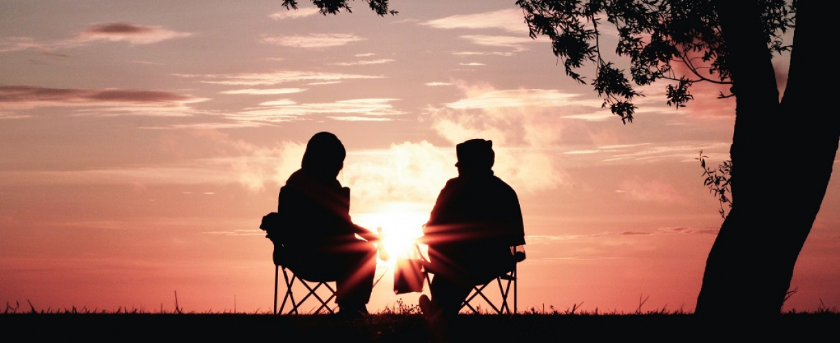 A conversation at sunset