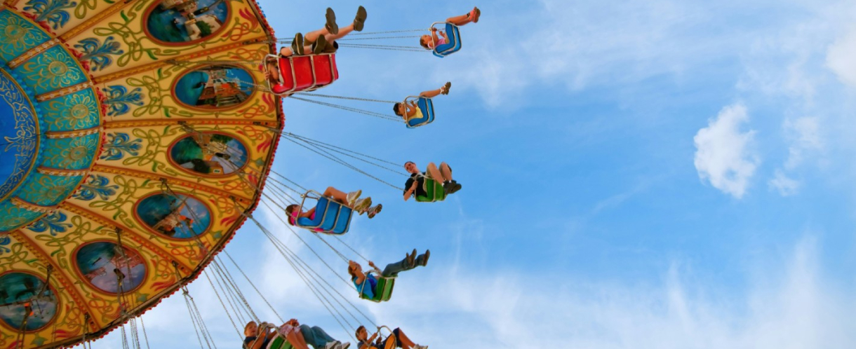 Image of people on a fairground ride